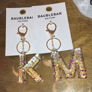 ✨Baublebar 2 pairs of K and M rainbow bling sparkle bag charms NWT